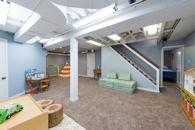 2124 Brockman Blvd, Ann Arbor, MI 48104 - finished below grade area featuring carpet floors, stairway, and baseboards