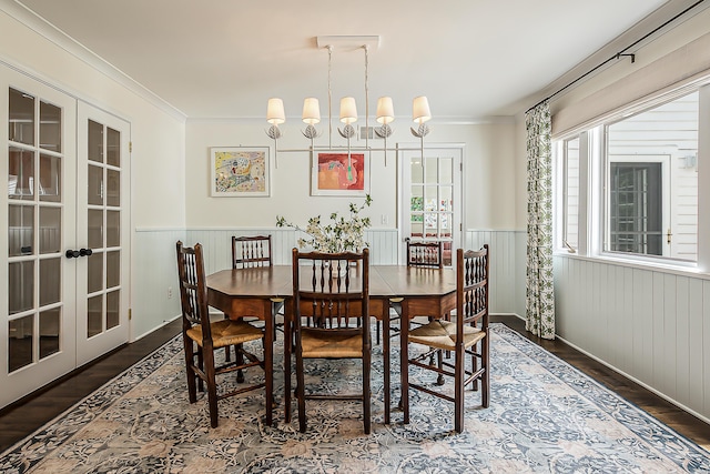 2124 Brockman Blvd, Ann Arbor, MI 48104 - dining space featuring wainscoting, wood finished floors, ornamental molding, and french doors