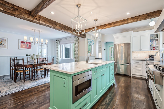 2124 Brockman Blvd, Ann Arbor, MI 48104 - kitchen with appliances with stainless steel finishes, a chandelier, green cabinetry, a sink, and beamed ceiling