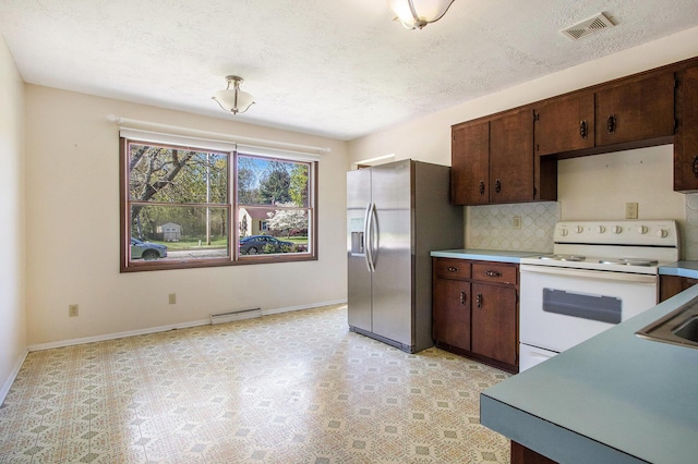 2151 Brown School Rd, Saint Joseph, MI 49085 - kitchen featuring white electric range, stainless steel refrigerator with ice dispenser, tasteful backsplash, and baseboards