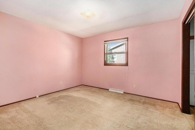 2151 Brown School Rd, Saint Joseph, MI 49085 - empty room featuring carpet floors, baseboards, and a textured ceiling