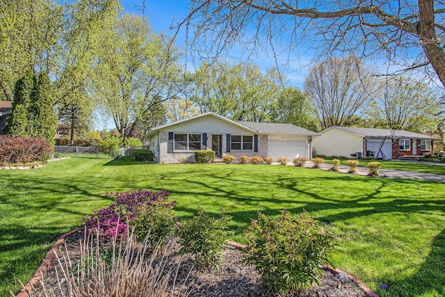 2151 Brown School Rd, Saint Joseph, MI 49085 - view of front of property featuring a garage and brick siding