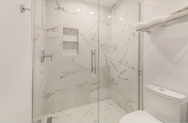 3203 Asher Rd, Ann Arbor, MI 48104 - full bathroom featuring toilet and a marble finish shower