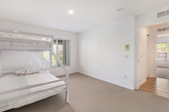 3203 Asher Rd, Ann Arbor, MI 48104 - bedroom with light carpet, baseboards, and recessed lighting
