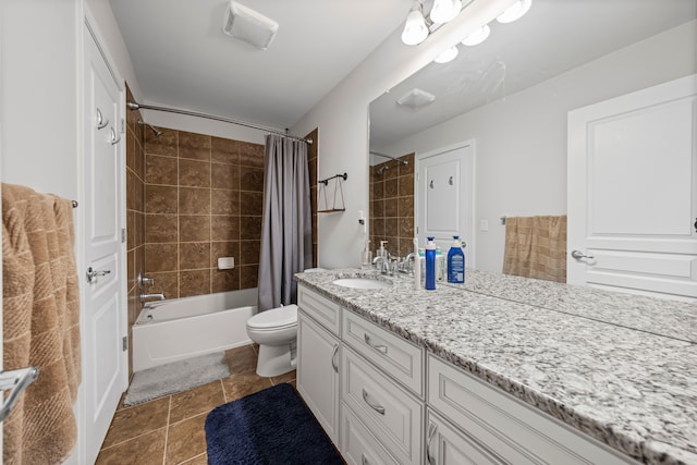 bathroom with vanity, shower / bathtub combination with curtain, toilet, and tile patterned floors