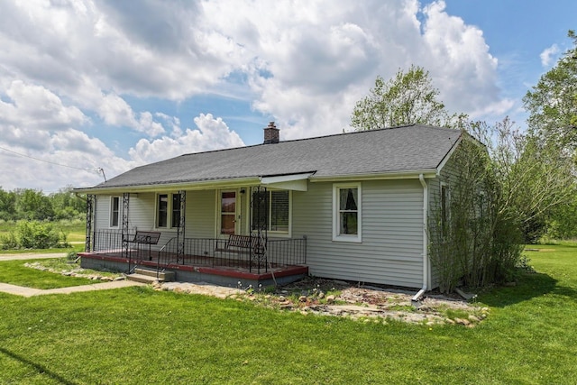 11010 N Holly Rd, Holly, MI 48442 - ranch-style home with covered porch, a chimney, a front yard, and roof with shingles