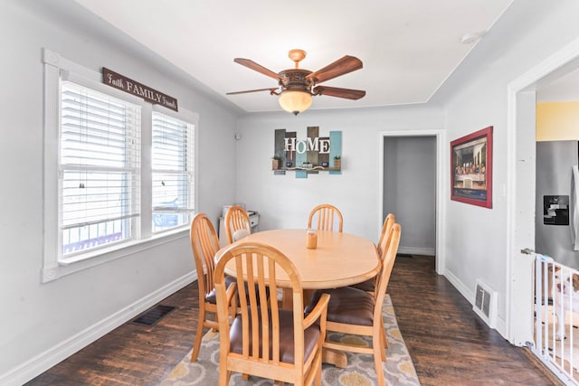 11010 N Holly Rd, Holly, MI 48442 - dining area featuring wood finished floors, baseboards, and a ceiling fan