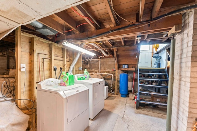 11010 N Holly Rd, Holly, MI 48442 - unfinished basement featuring washing machine and clothes dryer and a water pressure tank