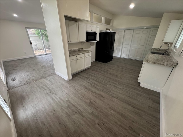 29592 Fairfax St, Southfield, MI 48076 - kitchen with a sink, black appliances, dark wood-type flooring, recessed lighting, and baseboards