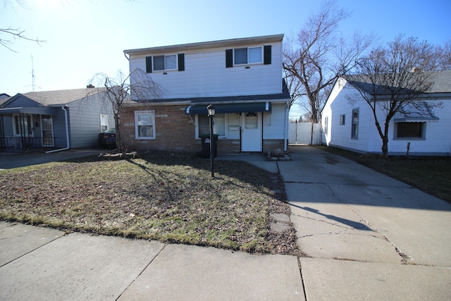 11436 Syracuse St, Taylor, MI 48180 - traditional-style home featuring driveway and brick siding