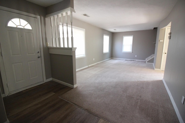 11436 Syracuse St, Taylor, MI 48180 - carpeted entryway featuring baseboards and wood finished floors