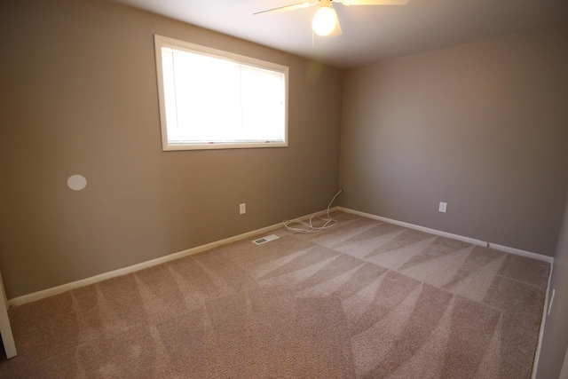11436 Syracuse St, Taylor, MI 48180 - empty room featuring ceiling fan, light carpet, and baseboards