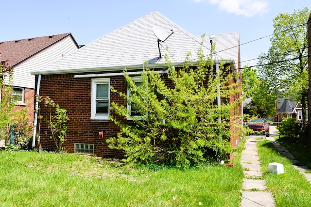 10039 Mark Twain St, Detroit, MI 48227 - view of property exterior featuring brick siding