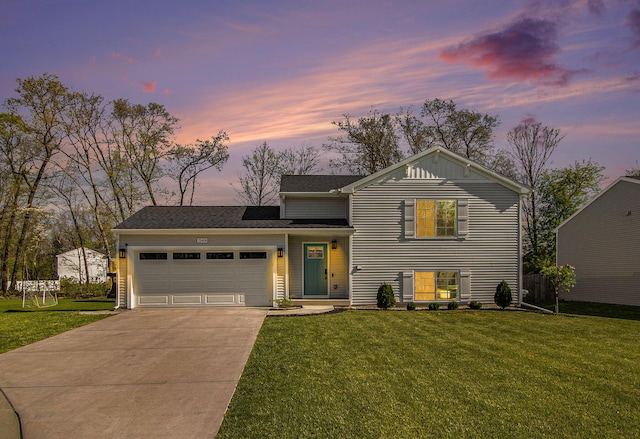 25808 Forest Ln, Mattawan, MI 49071 - tri-level home with a garage, driveway, and a front yard