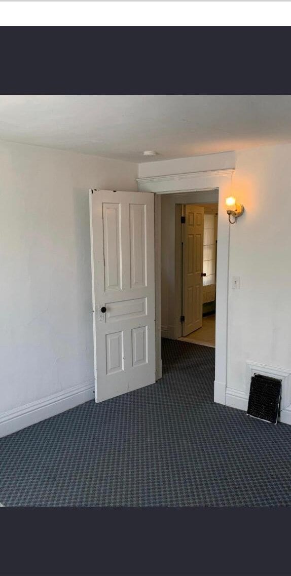 522 N Main St, Ann Arbor, MI 48104 - empty room with carpet flooring