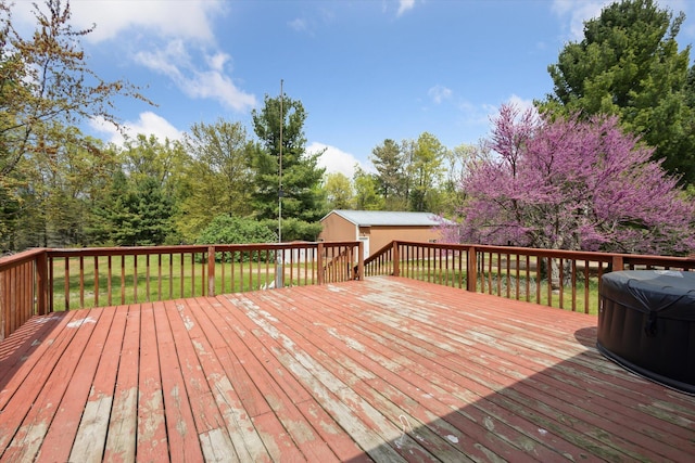 wooden terrace with an outdoor structure