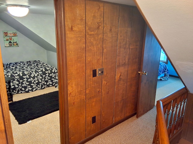 corridor with carpet floors