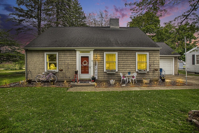 77 S Sprague St, Coldwater, MI 49036 - cape cod house featuring a chimney, a front yard, entry steps, and roof with shingles