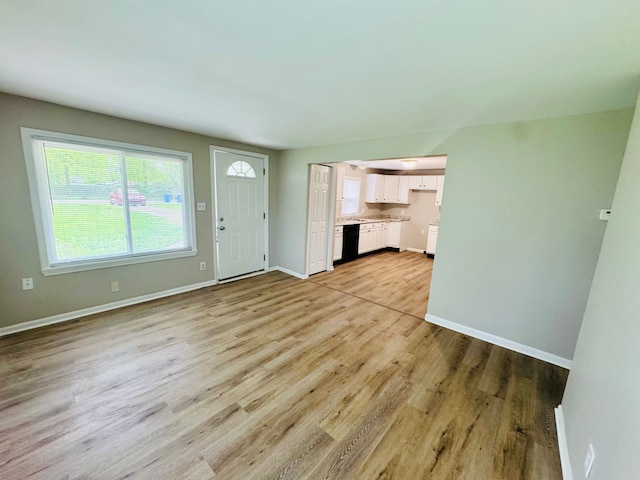 21974 Elroy Ave, Warren, MI 48089 - unfurnished living room featuring light wood-style floors and baseboards