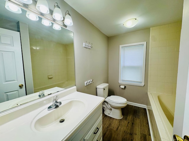 21974 Elroy Ave, Warren, MI 48089 - full bathroom featuring wood finished floors, vanity, toilet, and baseboards