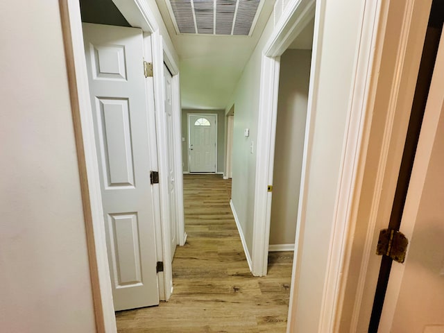 21974 Elroy Ave, Warren, MI 48089 - hallway featuring light wood-style flooring and baseboards