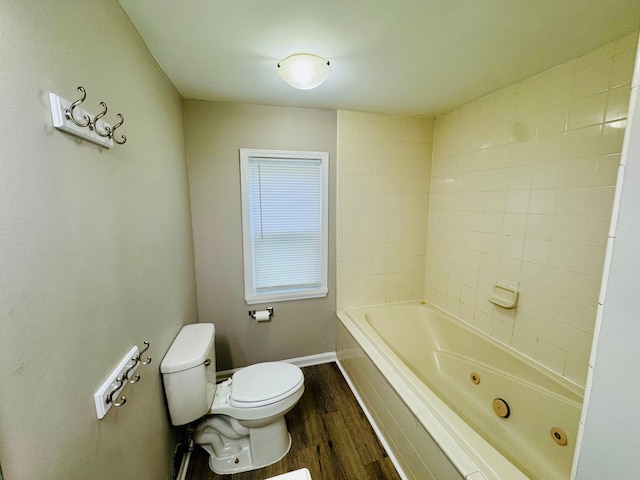 21974 Elroy Ave, Warren, MI 48089 - full bathroom featuring wood finished floors, toilet, a whirlpool tub, and baseboards