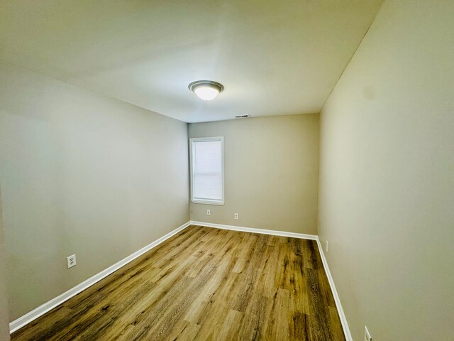 21974 Elroy Ave, Warren, MI 48089 - unfurnished room featuring wood finished floors and baseboards