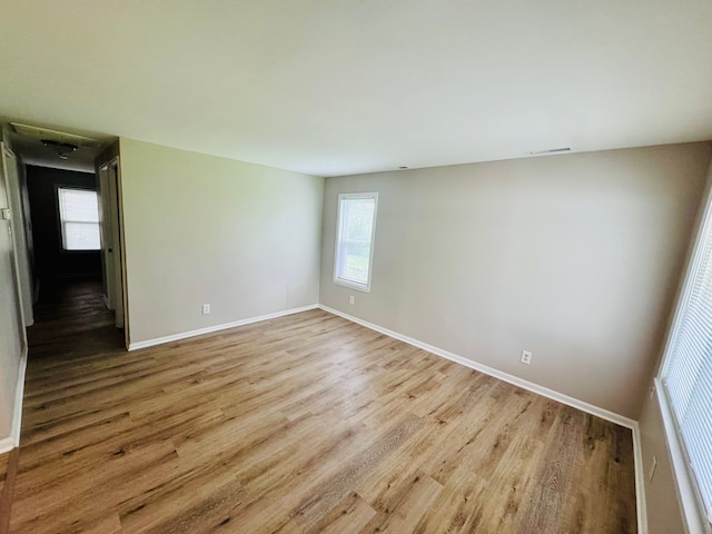 21974 Elroy Ave, Warren, MI 48089 - empty room featuring wood finished floors and baseboards