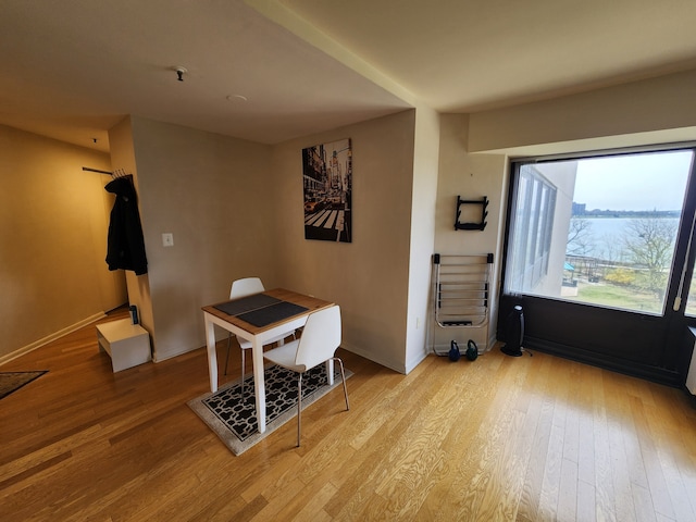 1001 W Jefferson Ave # 4D, Detroit, MI 48226 - office area featuring wood finished floors and baseboards
