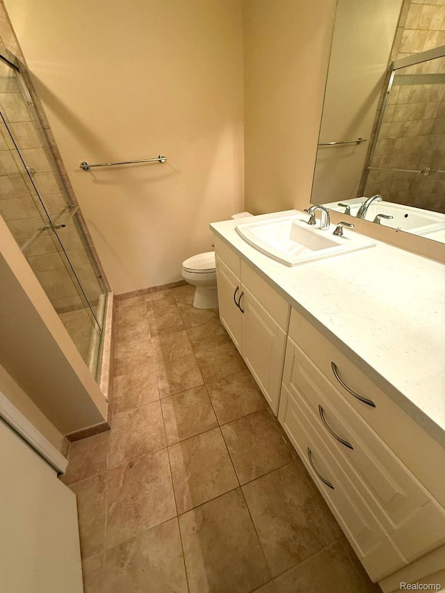 27915 Berrywood Ln Unit 72, Farmington Hills, MI 48334 - bathroom featuring a shower stall, tile patterned flooring, vanity, and toilet
