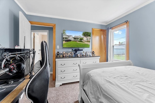 carpeted bedroom with ornamental molding