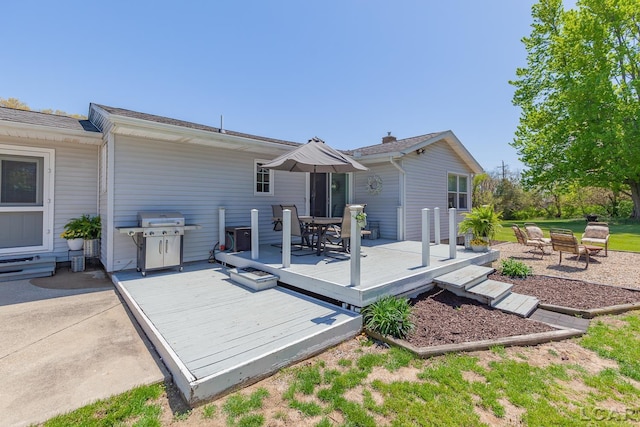4730 Occidental Hwy, Adrian, MI 49221 - rear view of house featuring outdoor dining space and a wooden deck