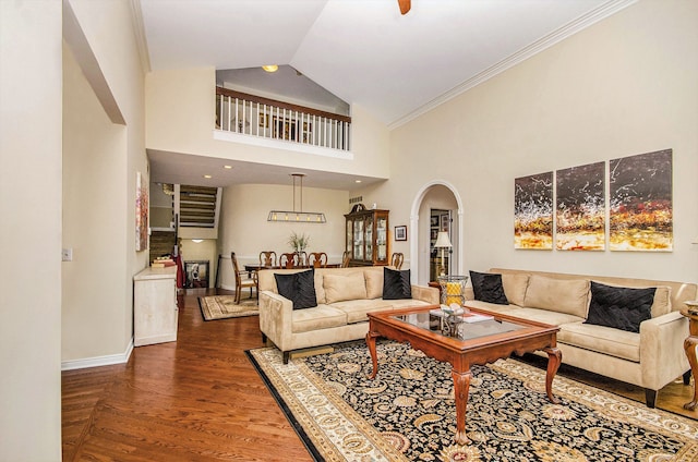2200 Clearwood, Shelby Twp, MI 48316 - living room with arched walkways, crown molding, baseboards, high vaulted ceiling, and wood finished floors