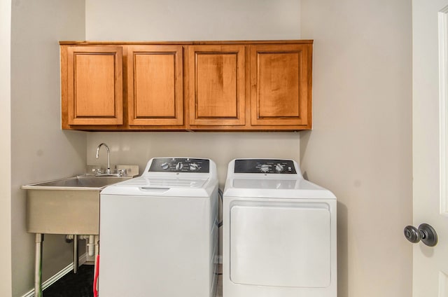 2200 Clearwood, Shelby Twp, MI 48316 - laundry room featuring washer and dryer and cabinet space