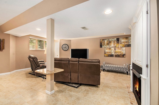 2200 Clearwood, Shelby Twp, MI 48316 - living area with baseboards, light tile patterned floors, recessed lighting, and a lit fireplace
