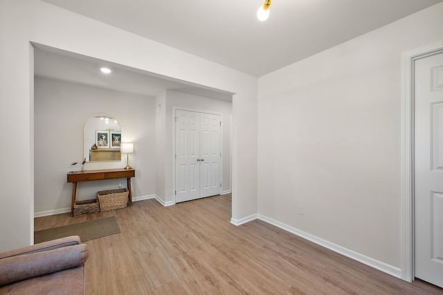346 Quartz Way, White Lake, MI 48386 - living area with light wood-style flooring, baseboards, and recessed lighting