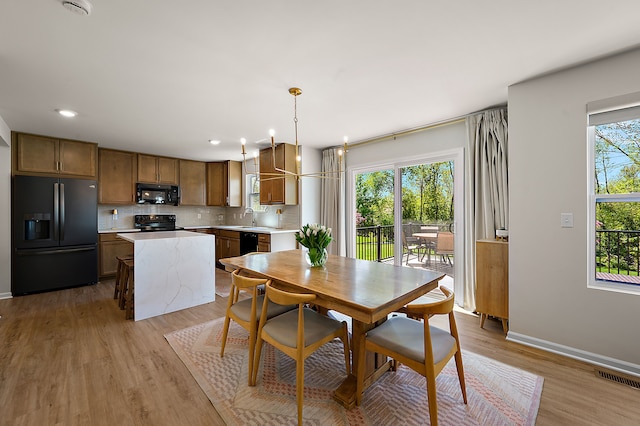 346 Quartz Way, White Lake, MI 48386 - dining room featuring light wood-type flooring, baseboards, and recessed lighting