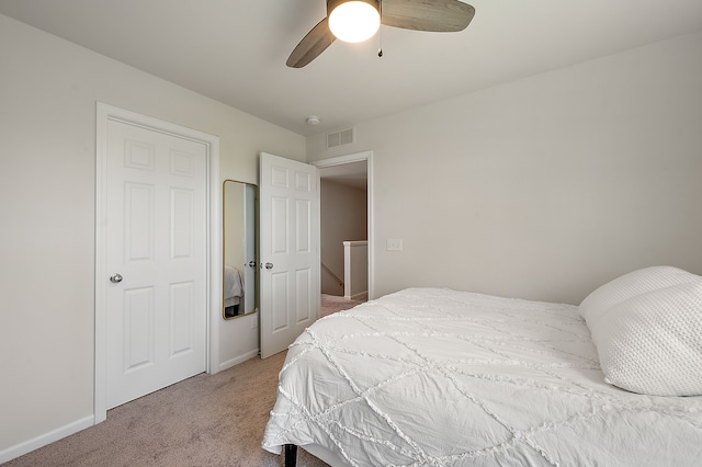 346 Quartz Way, White Lake, MI 48386 - bedroom with carpet, baseboards, and a ceiling fan