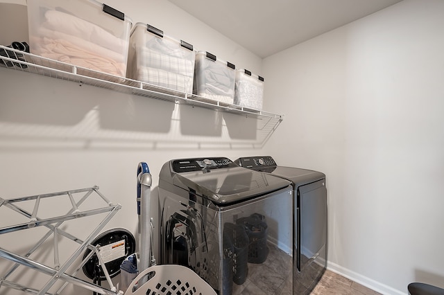 346 Quartz Way, White Lake, MI 48386 - washroom with independent washer and dryer and baseboards