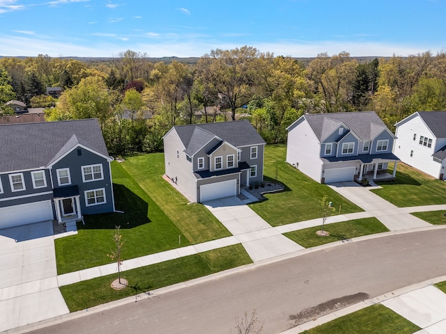 346 Quartz Way, White Lake, MI 48386 - aerial perspective of suburban area with a heavily wooded area
