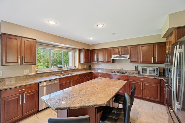 7039 Timberview Trl, West Bloomfield, MI 48322 - kitchen featuring appliances with stainless steel finishes, a sink, under cabinet range hood, a breakfast bar area, and light tile patterned floors