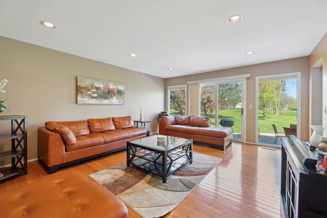 7039 Timberview Trl, West Bloomfield, MI 48322 - living room with recessed lighting, light wood-style flooring, and baseboards