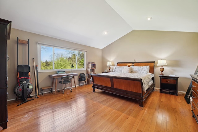 7039 Timberview Trl, West Bloomfield, MI 48322 - bedroom featuring vaulted ceiling and light wood-style floors
