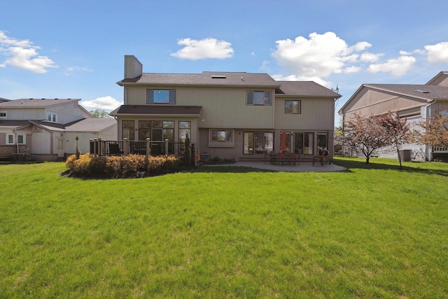 7039 Timberview Trl, West Bloomfield, MI 48322 - back of property with a chimney, a patio, a lawn, and central AC