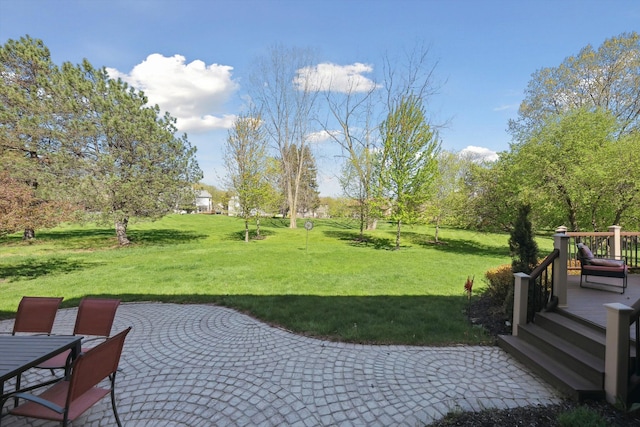 7039 Timberview Trl, West Bloomfield, MI 48322 - view of green lawn with a patio area