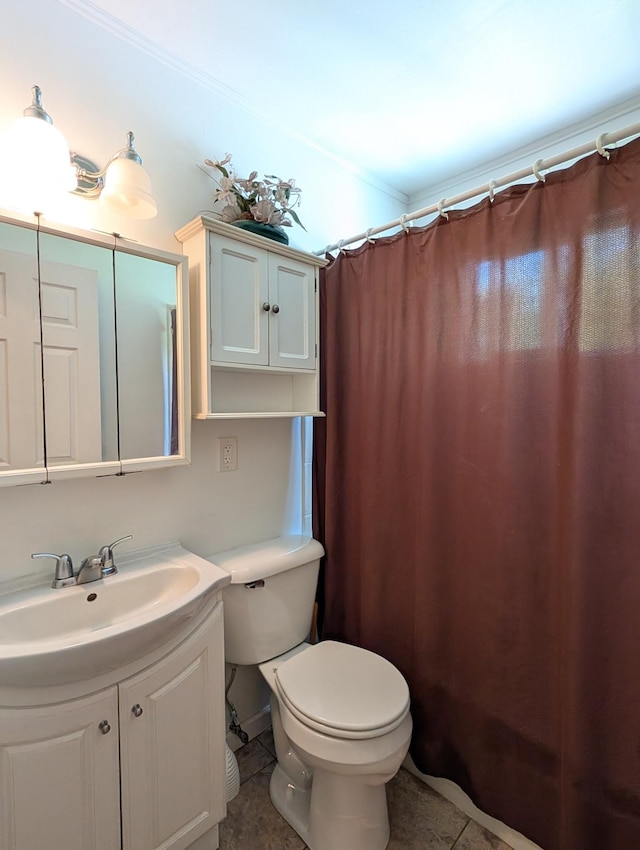 5062 Kendall Dr, Burton, MI 48509 - full bath with tile patterned floors, toilet, and vanity