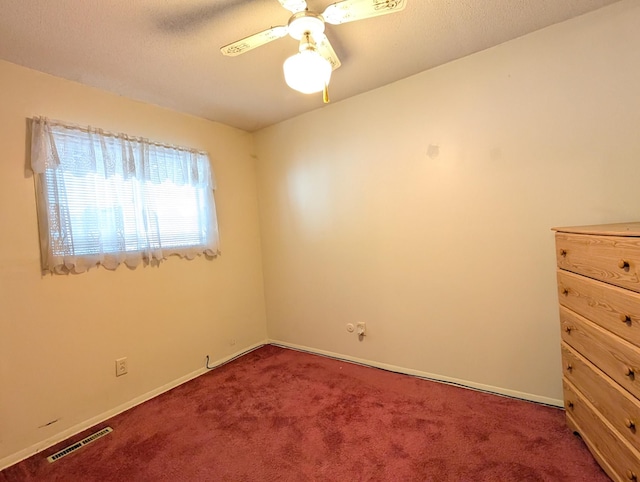 5062 Kendall Dr, Burton, MI 48509 - carpeted empty room with a ceiling fan and baseboards