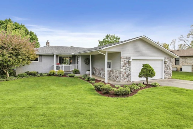ranch-style home featuring a porch, a garage, concrete driveway, a front yard, and a chimney