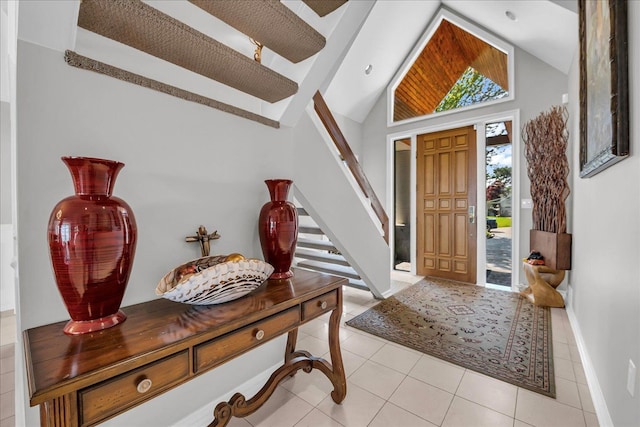 32630 Jefferson Ave, Saint Clair Shores, MI 48082 - entrance foyer featuring lofted ceiling, light tile patterned flooring, stairs, and baseboards