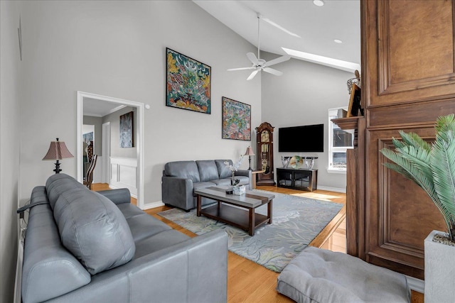 32630 Jefferson Ave, Saint Clair Shores, MI 48082 - living area featuring a skylight, light wood-style floors, a ceiling fan, high vaulted ceiling, and recessed lighting